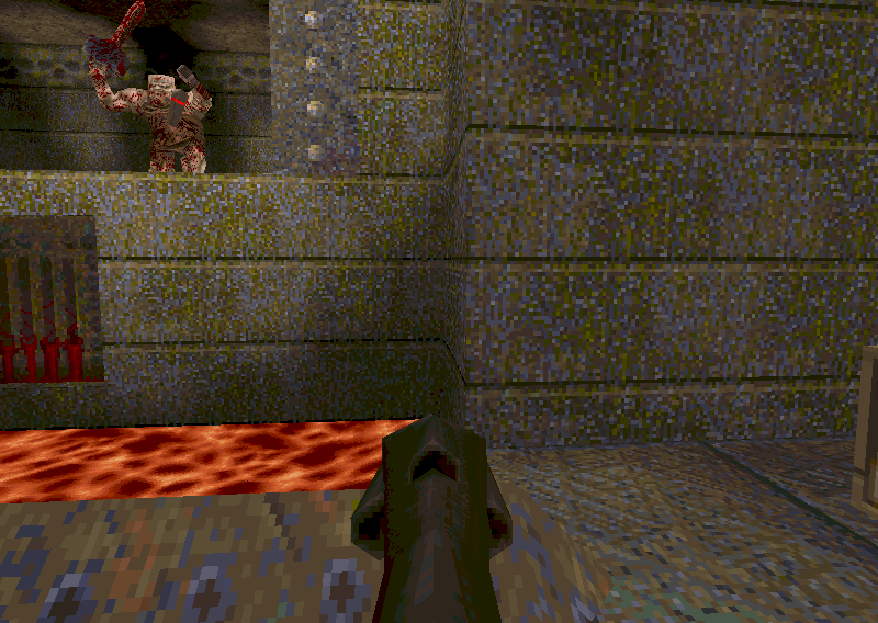 An ogre with a chainsaw on a ledge above a lava pool in Quake